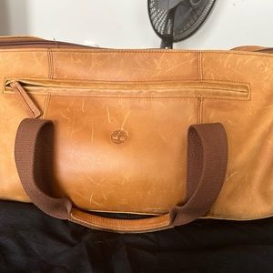 Barely used leather timberland duffel bag